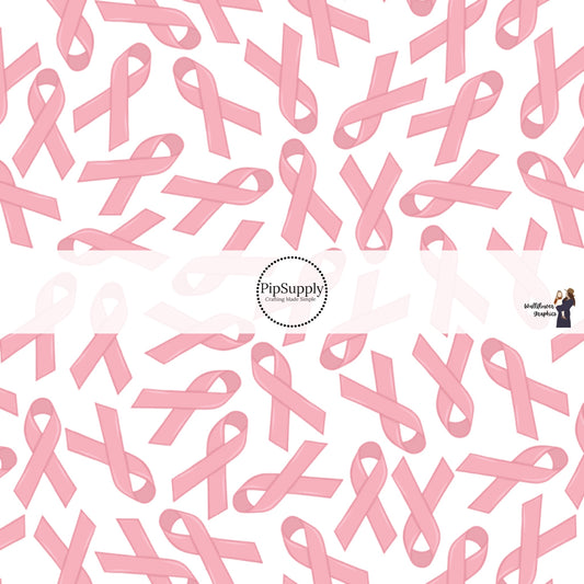 These Breast Cancer Awareness fabric by the yard features breast cancer ribbons in light pink on white. This pattern fabric can be used for all your sewing and crafting needs!