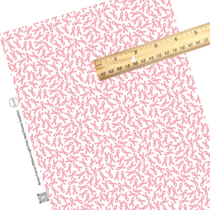 These Breast Cancer Awareness faux leather sheets contain the following design elements: breast cancer ribbons in light pink on white. Our CPSIA compliant faux leather sheets or rolls can be used for all types of crafting projects.