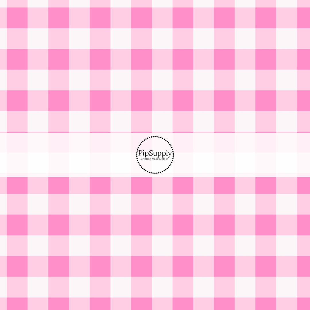 These holiday pattern themed fabric by the yard features light pink and white plaid pattern. This fun Christmas fabric can be used for all your sewing and crafting needs!