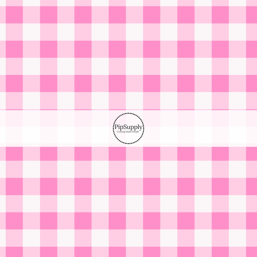 These holiday pattern themed fabric by the yard features light pink and white plaid pattern. This fun Christmas fabric can be used for all your sewing and crafting needs!