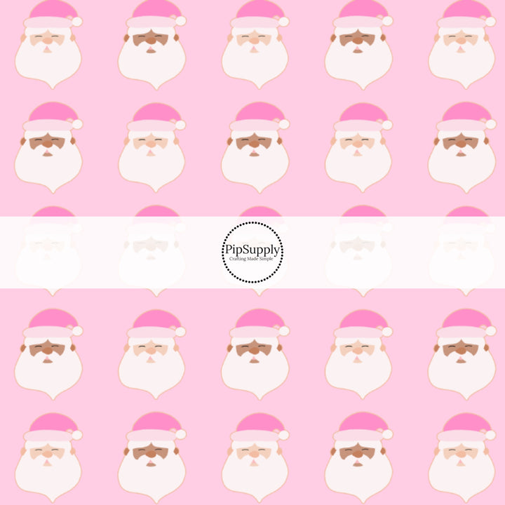 These holiday pattern themed fabric by the yard features Santas with pink Christmas hats on light pink. This fun Christmas fabric can be used for all your sewing and crafting needs!