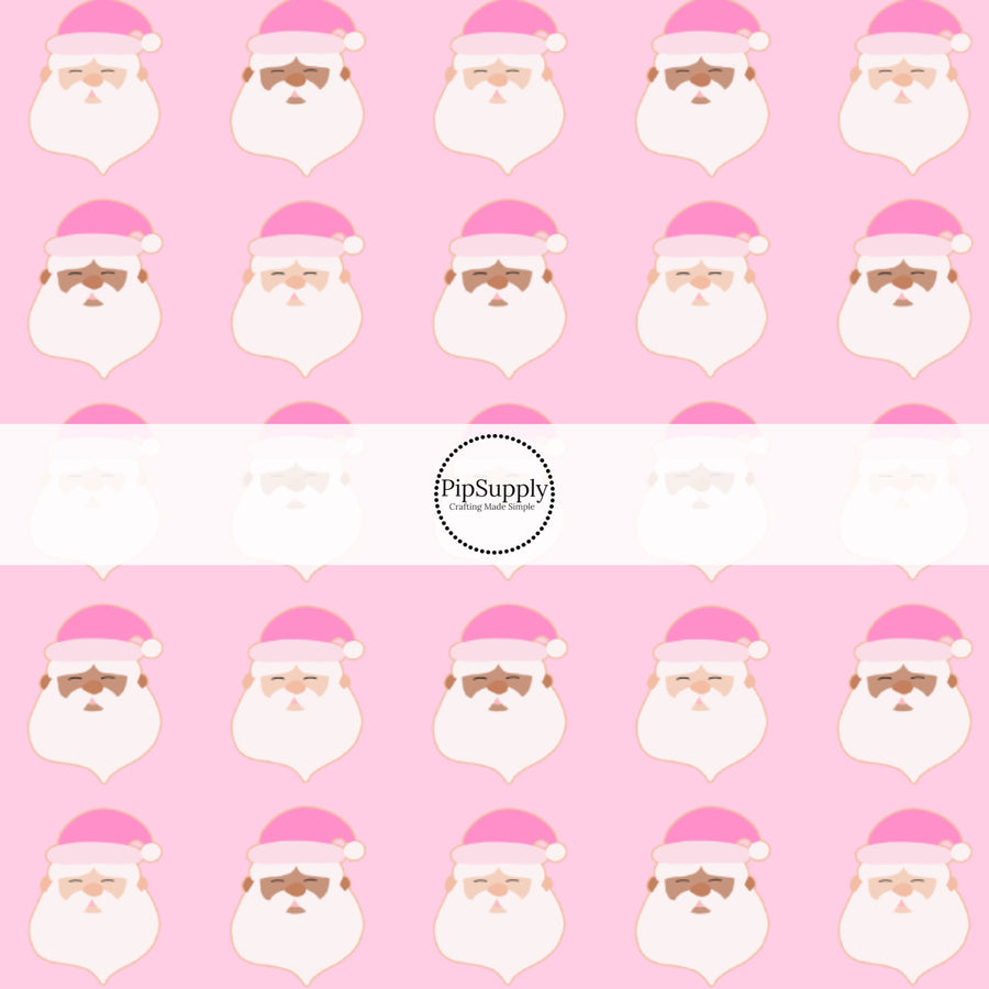 These holiday pattern themed fabric by the yard features Santas with pink Christmas hats on light pink. This fun Christmas fabric can be used for all your sewing and crafting needs!