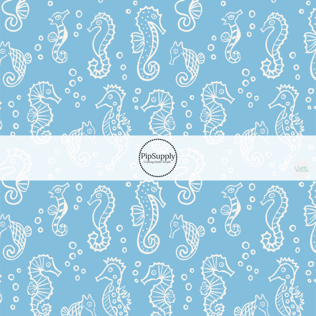 These ocean themed no sew bow strips can be easily tied and attached to a clip for a finished hair bow. These patterned bow strips are great for personal use or to sell. These bow strips feature white seahorses on blue.