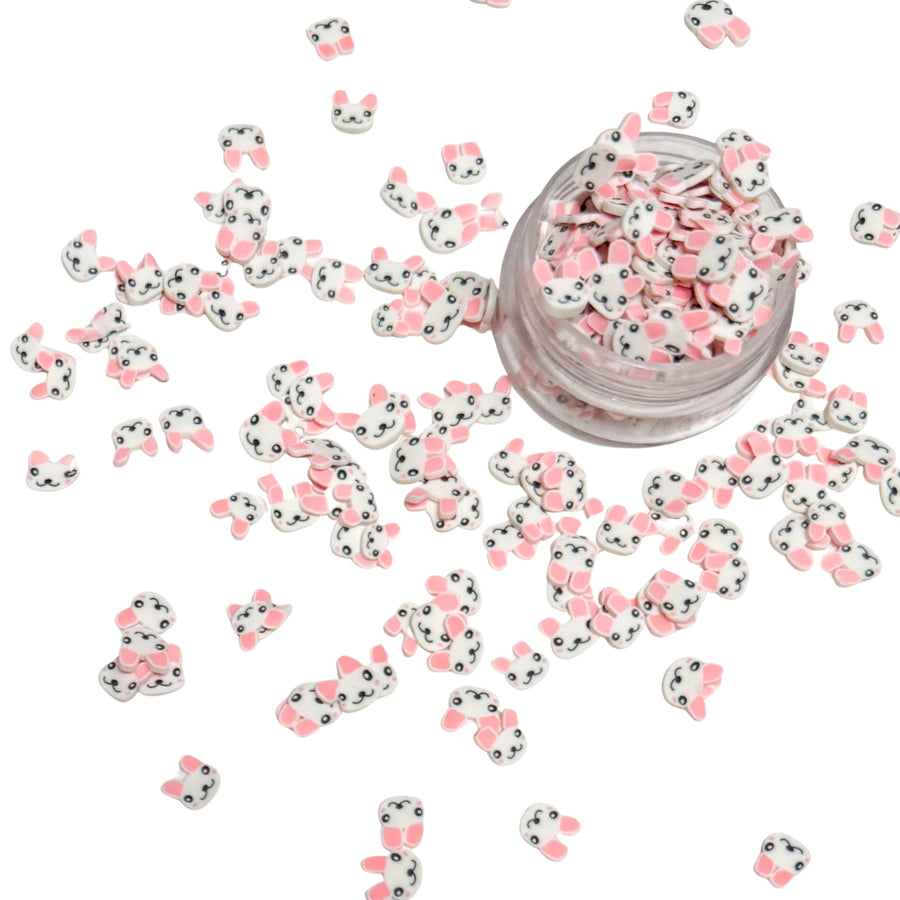 clay pieces shaped as bunny heads

 You can use it to add sparkle and decoration to resin projects, filling for shaker bows, slime making, party decor, scrapbooking, card making and nail art.

 This loose clay mix is sold in a resealable 1OZ Bag

- Material: Polymer Clay and Glitter