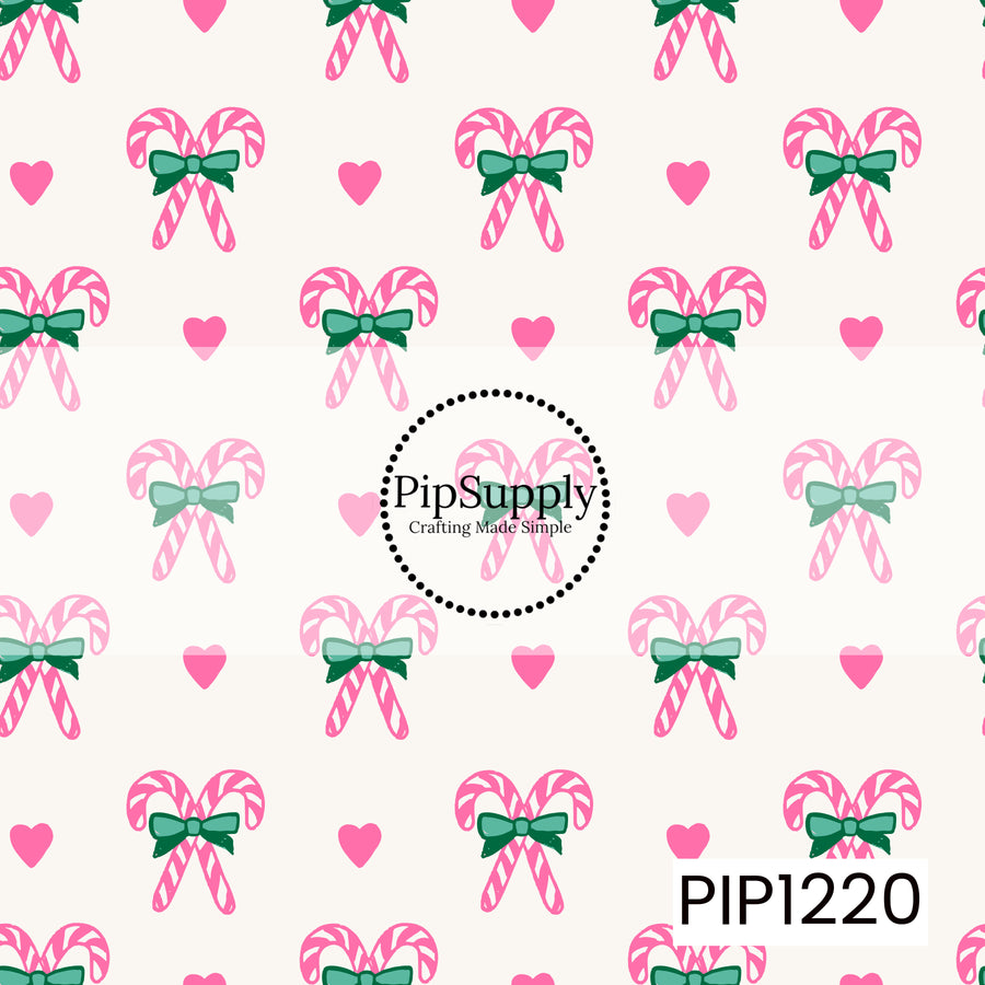 A playful Christmas pattern featuring pink and white candy canes paired together with deep green bows. Bright pink hearts are scattered throughout the warm cream background, giving the design a sweet, colorful holiday feel.
