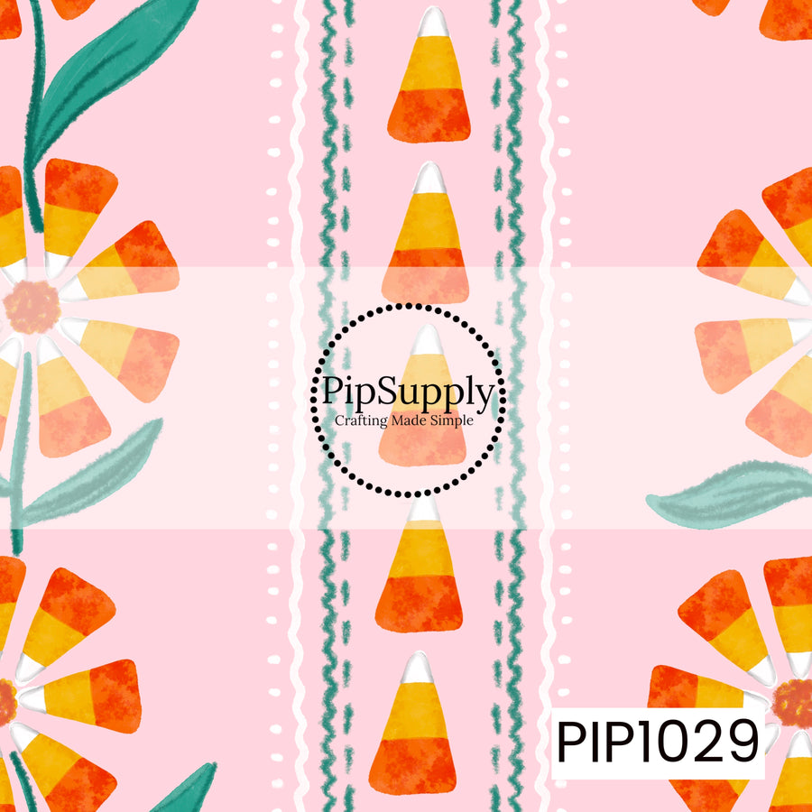 A whimsical vertical stripe pattern featuring candy corn blooms, watercolor candy corn, teal leafy accents, and playful stitched stripe details on a soft blush pink background. The cheerful mix of warm orange, yellow, white, and teal creates a sweet Halloween-inspired coordinate with a charming vintage folk art feel.

