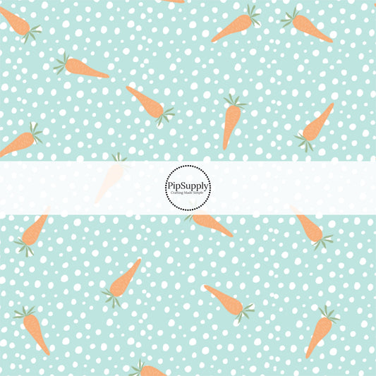 Scattered Orange Carrots and White Dot on Blue Fabric by the Yard.