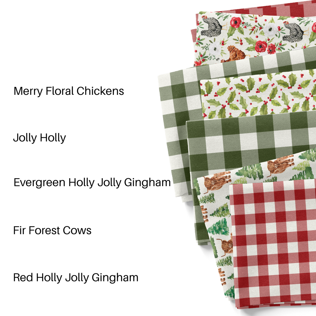 Red and green Cate and Rainn 2023 Christmas collection fabric swatches.