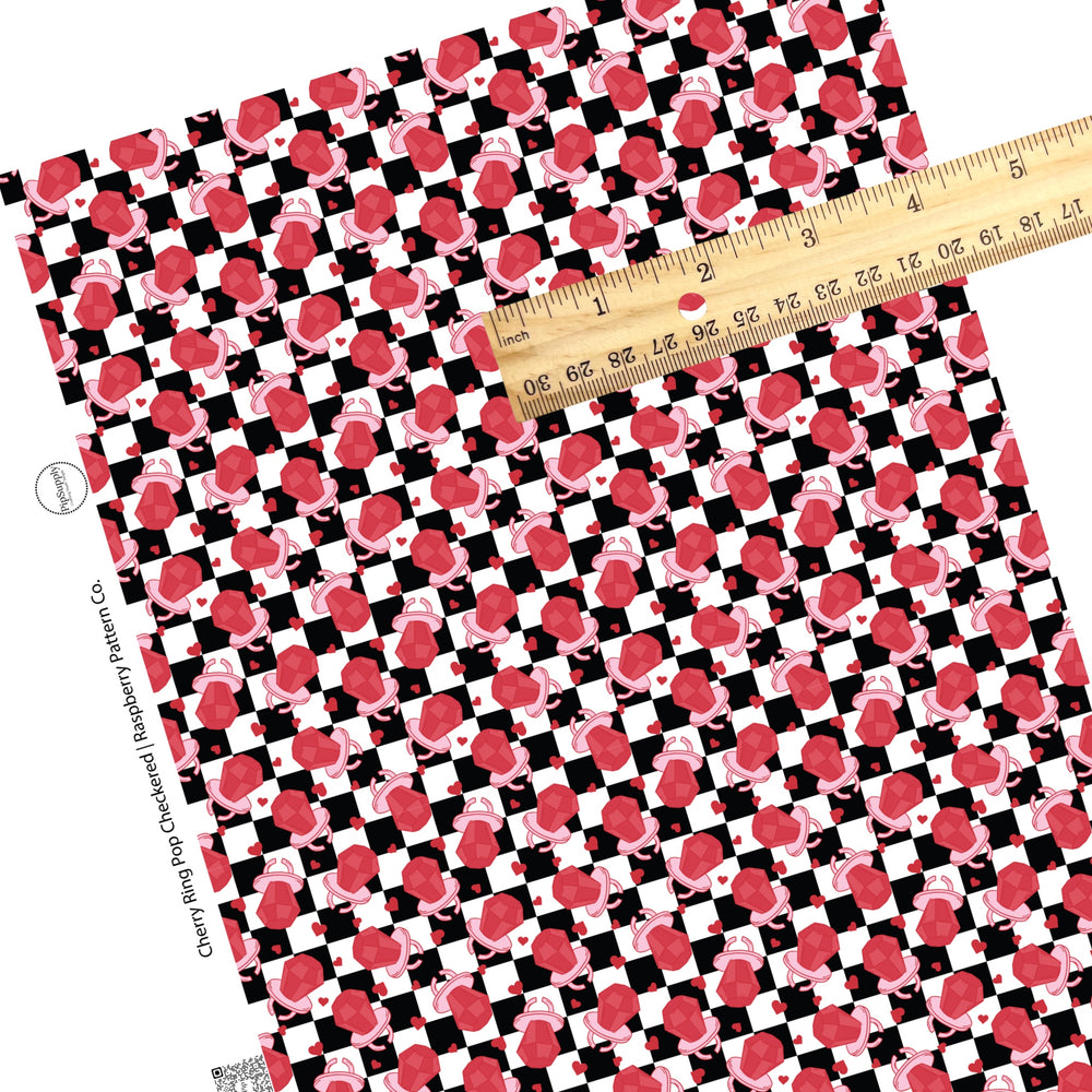 These Valentine's checker pattern themed faux leather sheets contain the following design elements: cherry ring pop candy on white and black checker pattern. Our CPSIA compliant faux leather sheets or rolls can be used for all types of crafting projects.