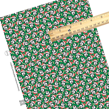 These holiday themed faux leather sheets contain the following design elements: Husky dogs with Christmas hats surrounded by dog bone treats on dark green. Our CPSIA compliant faux leather sheets or rolls can be used for all types of crafting projects.