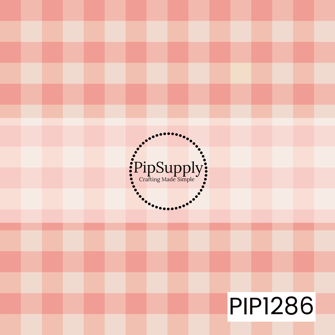 A soft gingham pattern featuring warm blush pink, peach, and creamy ivory tones. The classic oversized checks create a sweet, cozy look with a subtle vintage feel.
