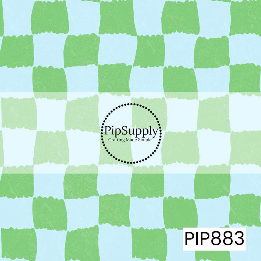 A playful hand-painted checkerboard pattern featuring alternating soft sky blue and fresh pastel green squares. The checks have irregular, brushstroke-style edges that create an organic, handcrafted appearance. A subtle distressed texture is layered throughout, adding depth and a lightly weathered finish. Bright, airy, and cheerful with a refreshing coastal-inspired color palette.
