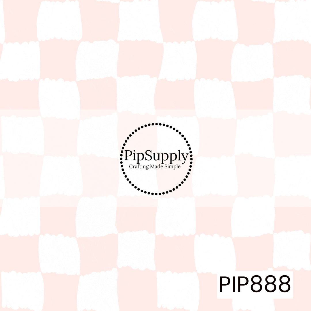 A playful hand-painted checkerboard pattern featuring alternating crisp white and soft blush pink squares. The checks have irregular, brushstroke-style edges that create an organic, handcrafted appearance. A subtle distressed texture is layered throughout, adding depth and a lightly weathered finish. Delicate, airy, and elegant with a gentle pastel color palette that evokes coastal charm, sweetness, and timeless simplicity.
