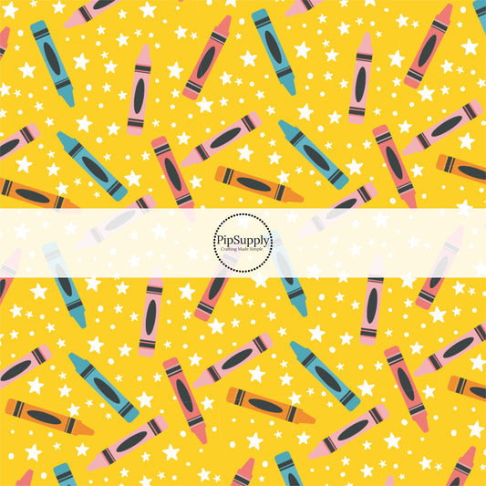 Yellow fabric by the yard with school crayons and white stars and dots.
