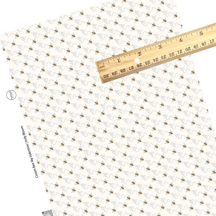 These Valentine's pattern themed faux leather sheets contain the following design elements: small bees and dotted hearts on cream. Our CPSIA compliant faux leather sheets or rolls can be used for all types of crafting projects.