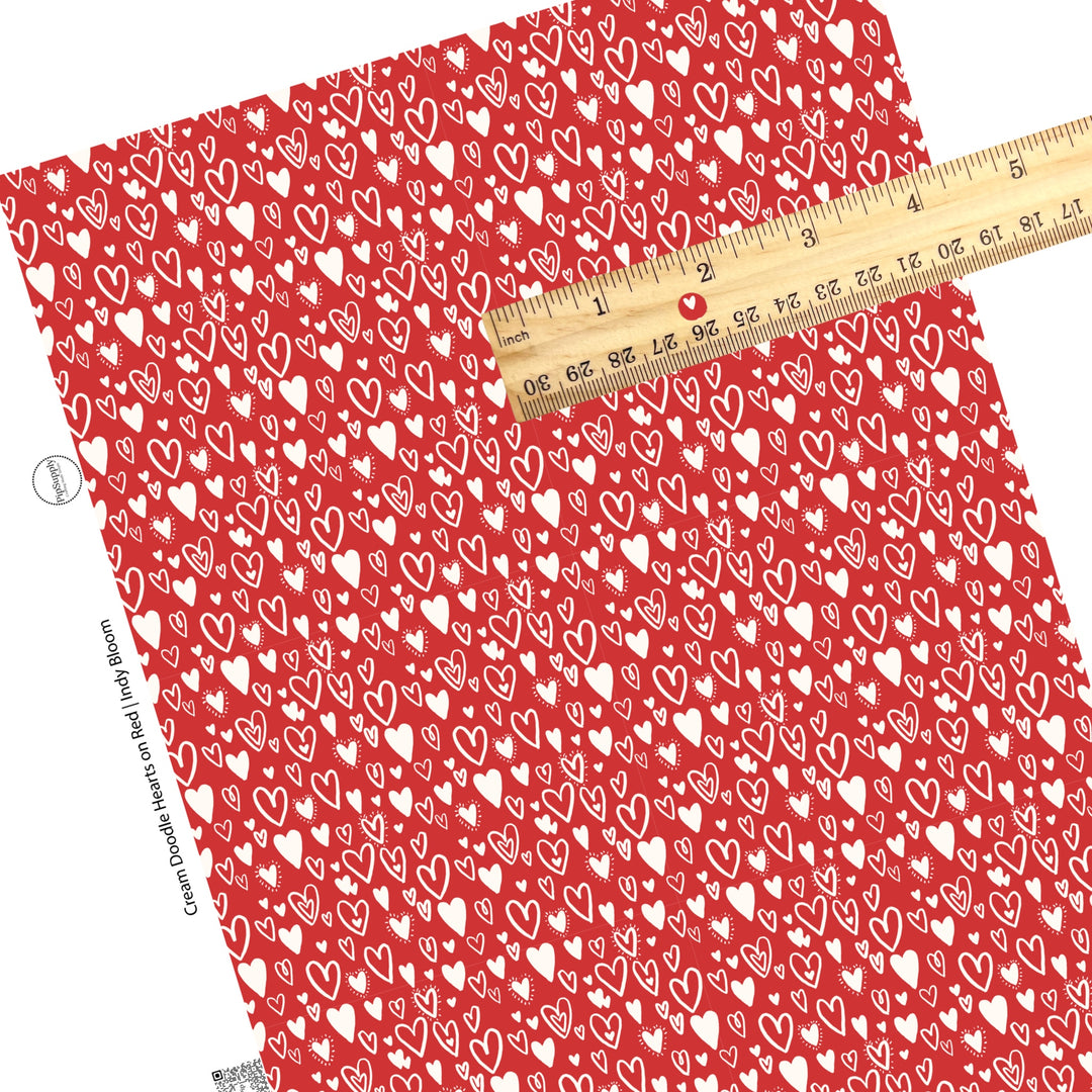 These Valentine's pattern themed faux leather sheets contain the following design elements: cream colored doodle hearts on red. Our CPSIA compliant faux leather sheets or rolls can be used for all types of crafting projects.