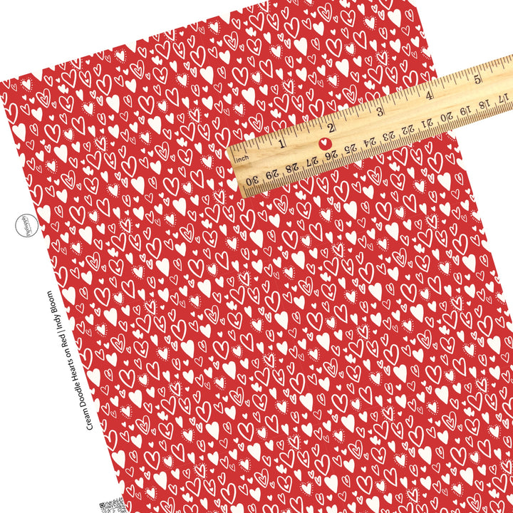 These Valentine's pattern themed faux leather sheets contain the following design elements: cream colored doodle hearts on red. Our CPSIA compliant faux leather sheets or rolls can be used for all types of crafting projects.