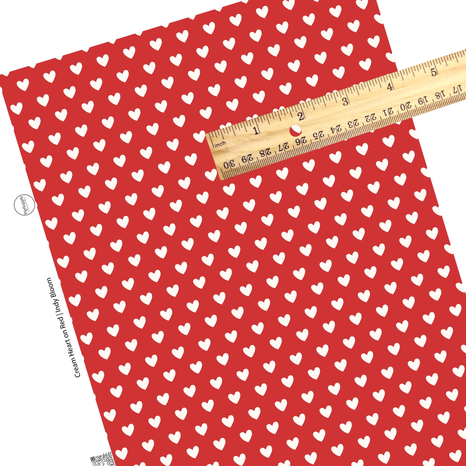 These Valentine's pattern themed faux leather sheets contain the following design elements: white hearts on red. Our CPSIA compliant faux leather sheets or rolls can be used for all types of crafting projects.