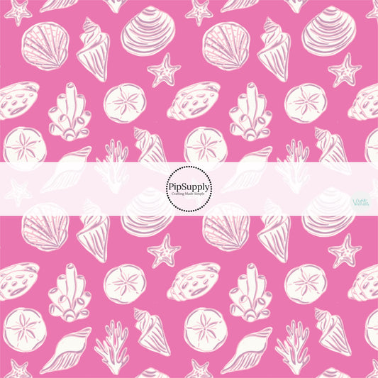 This beach fabric by the yard features white seashells on pink. This fun themed fabric can be used for all your sewing and crafting needs!