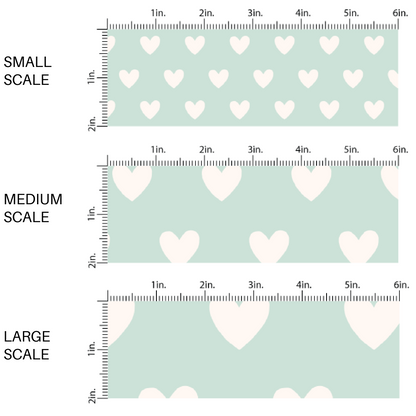 Cream Hearts on Pastel Aqua Fabric by the Yard scaled image guide.