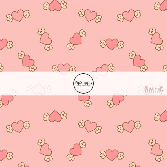 Hearts With Cupid Wings on Light Pink Fabric by the Yard.
