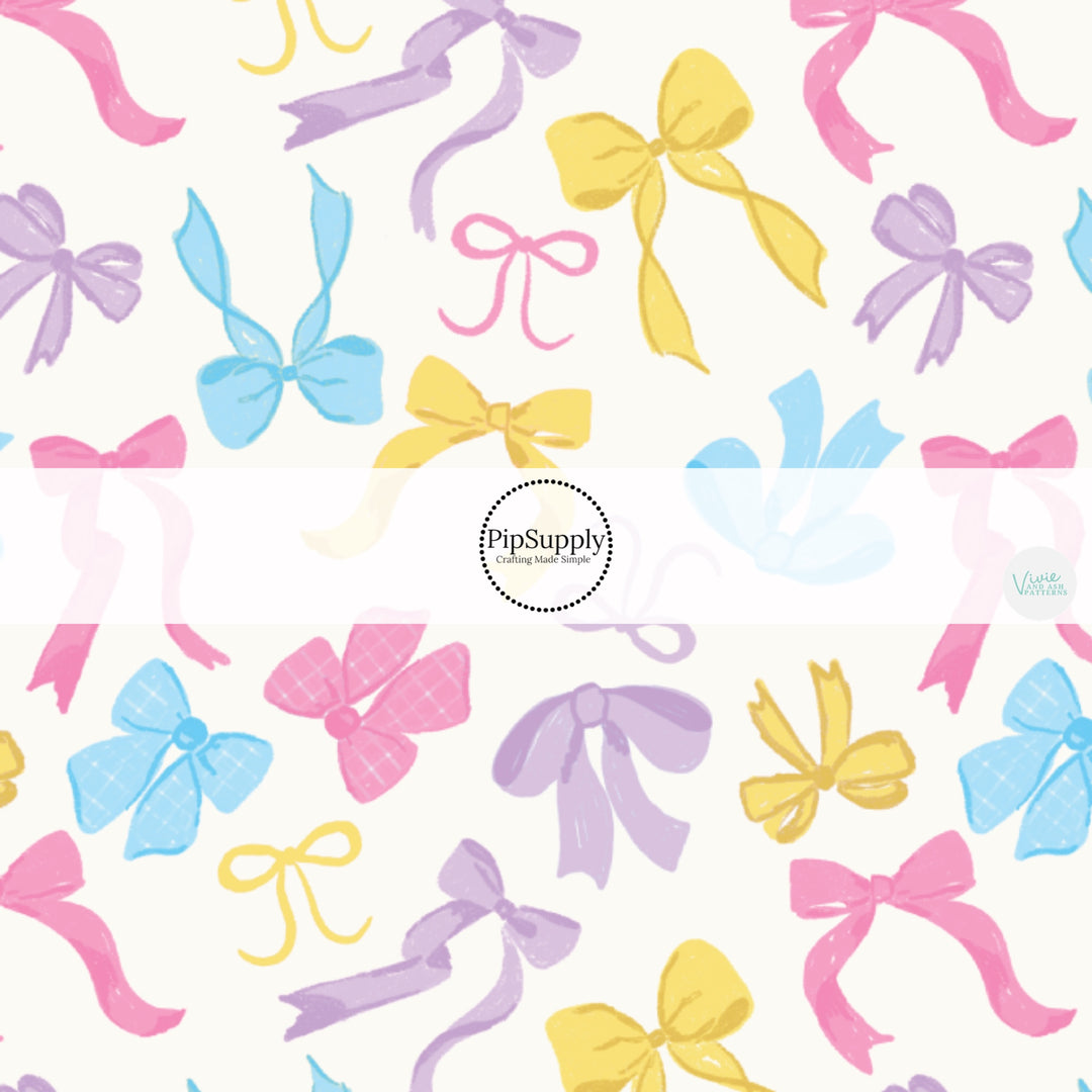 Yellow, Pink, Purple, and Blue Girly Bows on Cream Fabric by the Yard.