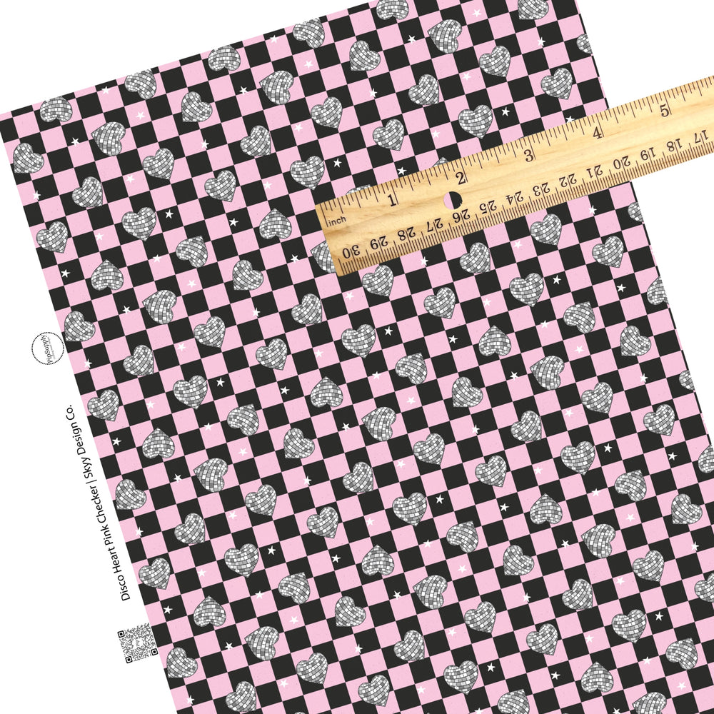 These checker pattern themed faux leather sheets contain the following design elements: light pink and black checker pattern with disco hearts. Our CPSIA compliant faux leather sheets or rolls can be used for all types of crafting projects.