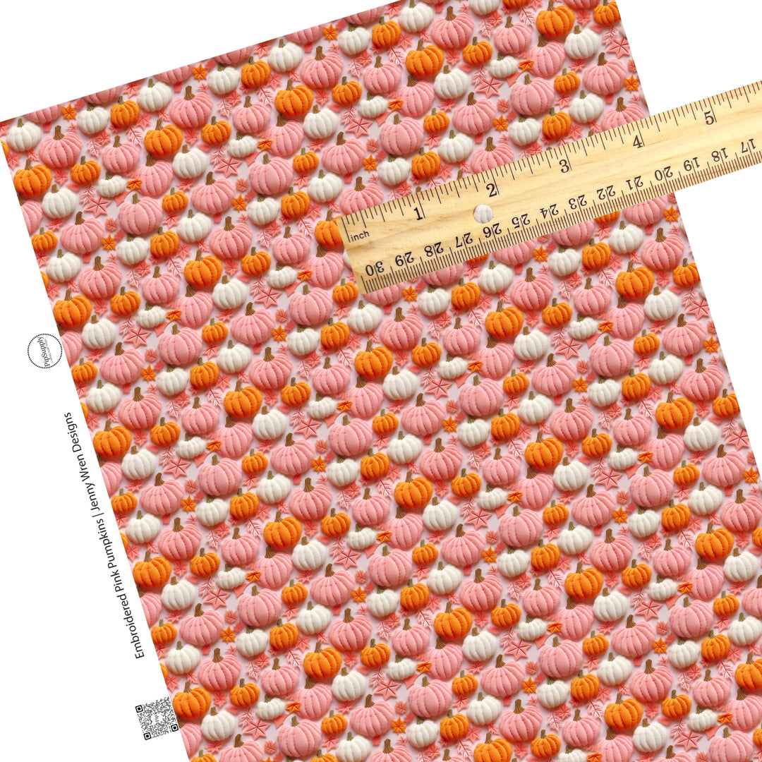 These holiday sewn pattern themed faux leather sheets contain the following design elements: orange, pink, and cream pumpkins and leaves on light pink. Our CPSIA compliant faux leather sheets or rolls can be used for all types of crafting projects.