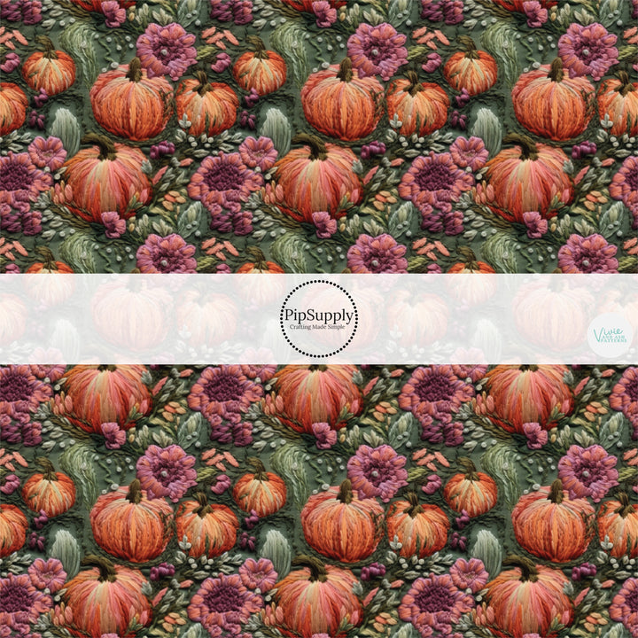 Green embroidered fabric by the yard with orange pumpkins and burgundy florals. 