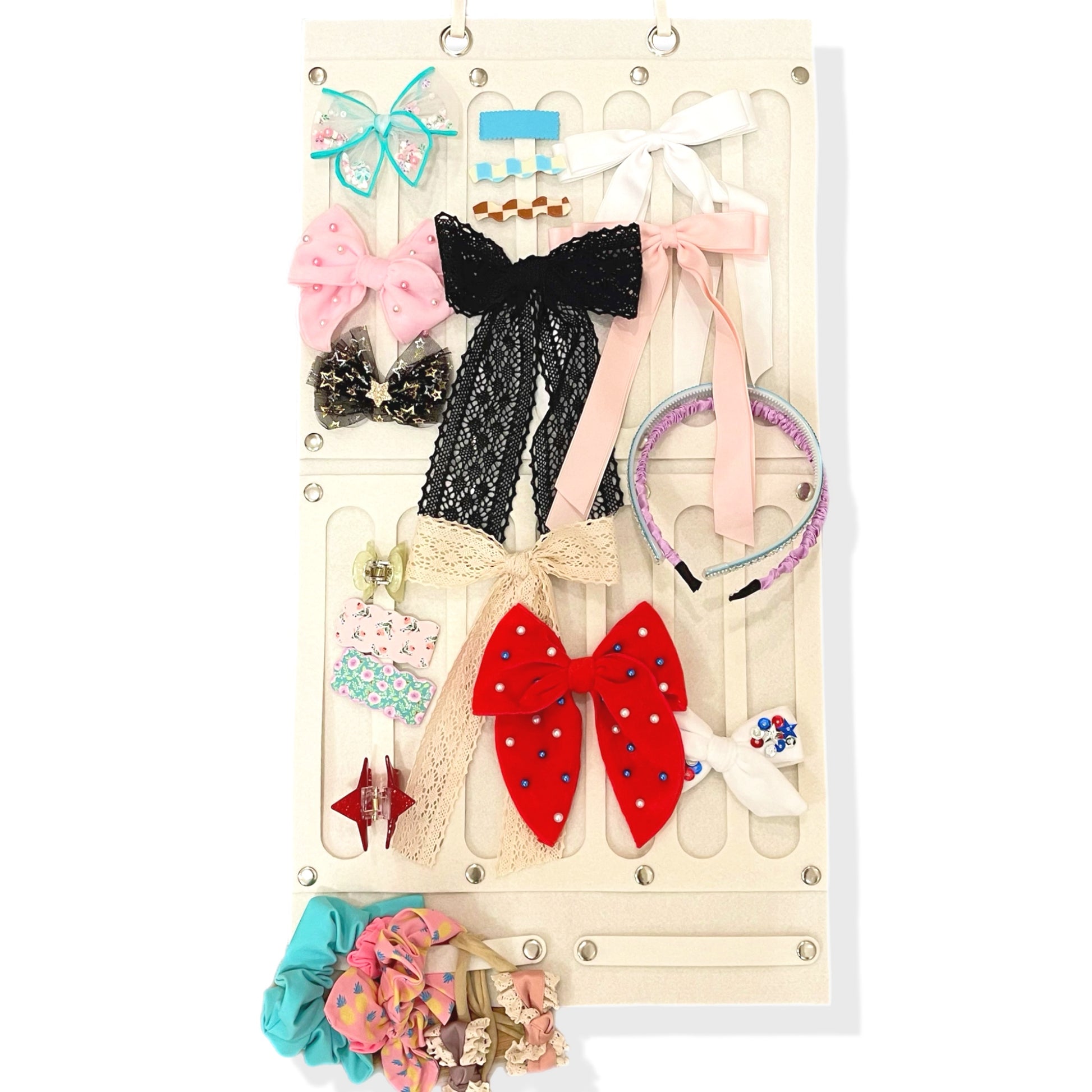 This felt bow organizer is an amazing storage option for bows, headbands, and hair clips. The organizer has two grommets on the top so it can be hung on a wall or door.