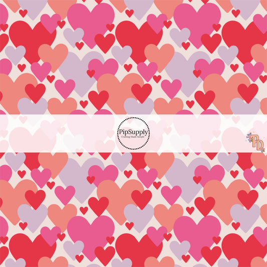 Pink, Red, Purple, and Peach Scattered Heart Fabric by the Yard