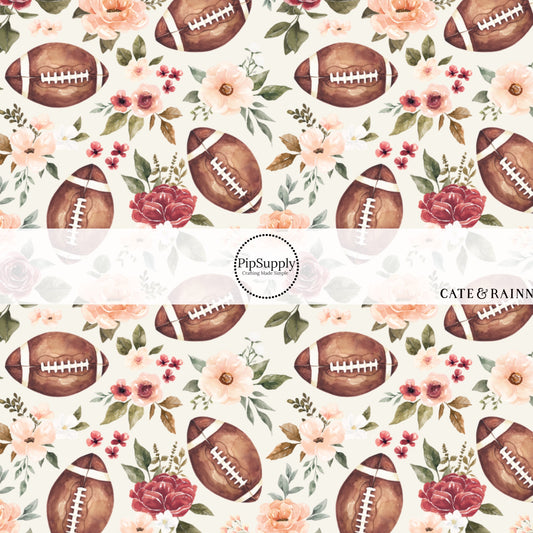 Cream fabric by the yard with scattered brown footballs and florals. 