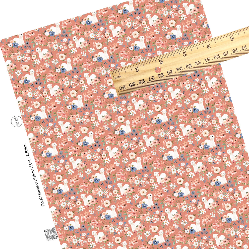 These llamas and flower pattern themed faux leather sheets contain the following design elements: white llamas surrounded by pink and blue flower bunches on salmon. Our CPSIA compliant faux leather sheets or rolls can be used for all types of crafting projects.