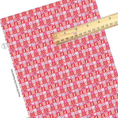 These Valentine's pattern themed faux leather sheets contain the following design elements: pink, purple, and red checker grid. Our CPSIA compliant faux leather sheets or rolls can be used for all types of crafting projects.