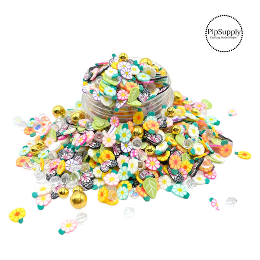 This green, yellow, and cream clay slices mix is versatile for many craft projects. This spring mix has beads, rhinestones, and clay butterflies and flowers. You can use it to add sparkle and decoration to resin projects, filling for shaker bows, slime making, party decor, scrapbooking, card making and nail art. 