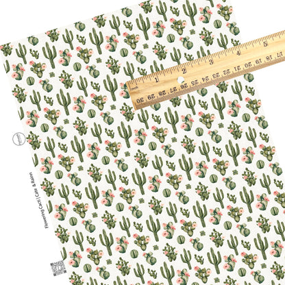 These cacti and flower pattern themed faux leather sheets contain the following design elements: pink flowers on cacti on cream. Our CPSIA compliant faux leather sheets or rolls can be used for all types of crafting projects.