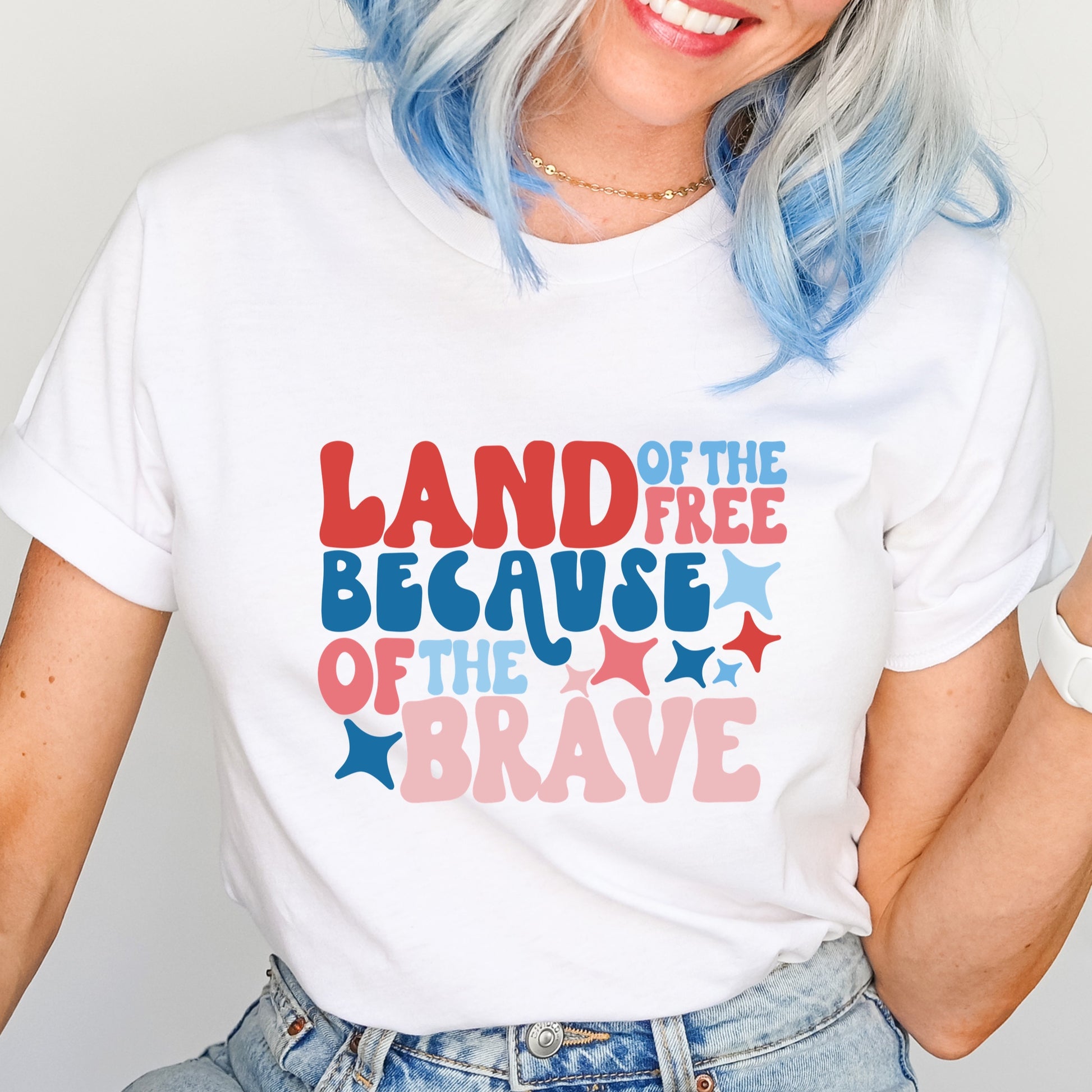 Patriotic phrase "Land of the Free Because of the Brave" red and blue iron on heat transfer.