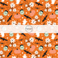 Orange fabric by the yard with Frank, ghosts, spiderwebs, pumpkins, spiders, and florals.