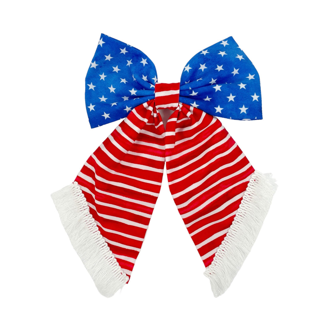 These patriotic country flair fringe bows are ready to package and resell to your customers no sewing or measuring necessary! It's the ultimate ode to Independence Day, with a touch of fringe and a whole lot of style! These hair bows come with a barrette clip already attached.