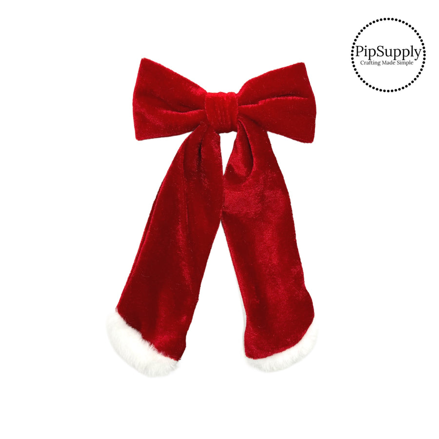 Theses red holiday fur trimmed velvet long tail hair bows are ready to package and resell to your customers no sewing or measuring necessary! These come pre-tied with an attached alligator clip. The Christmas bow is perfect for all hair styles for kids and adults.