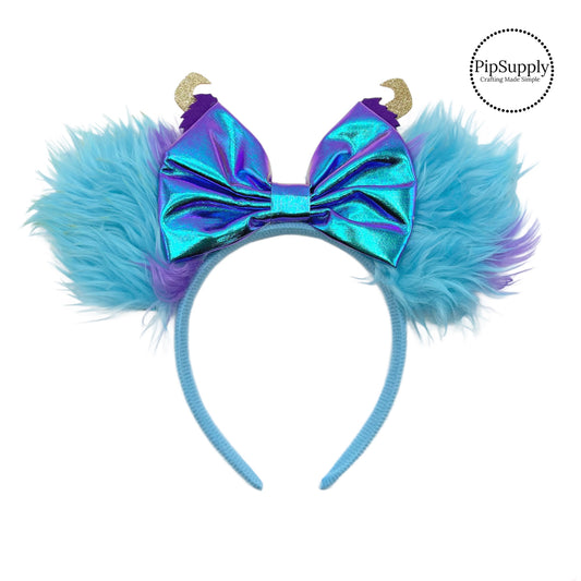 These blue mouse ear headbands are a stylish hair accessory. These comfortable headbands have an attached blue bow and furry mouse ears. Along with monster embellishments. This hair accessory comes completely assembled and is great for park vacations, costumes or for everyday wear!