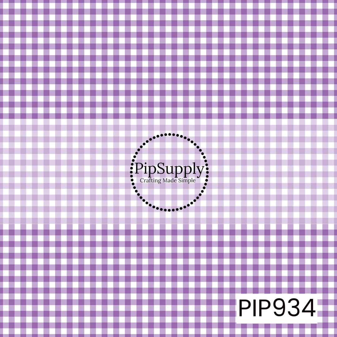 Soft lavender and white gingham check pattern with evenly spaced horizontal and vertical lines, creating a classic, seamless plaid design.
