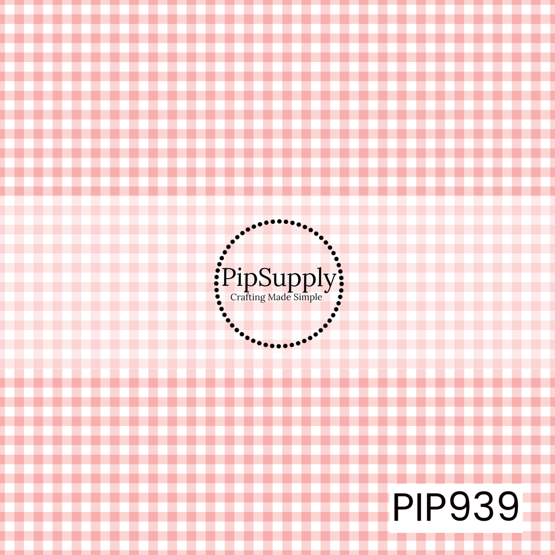 Soft pink and white gingham check pattern with evenly spaced horizontal and vertical lines, creating a classic, seamless plaid design.

