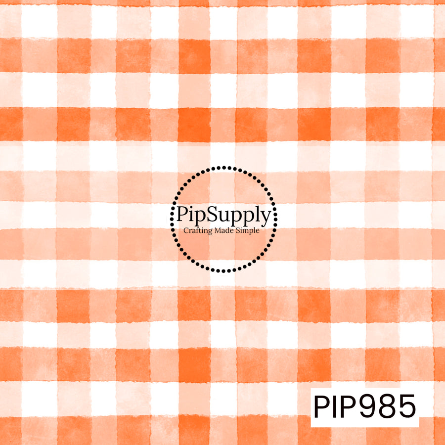 A seamless watercolor gingham pattern featuring soft pumpkin orange and warm peach squares layered over a crisp white background. The hand-painted texture and blended tones create a cozy, classic plaid with a light, airy fall feel.
