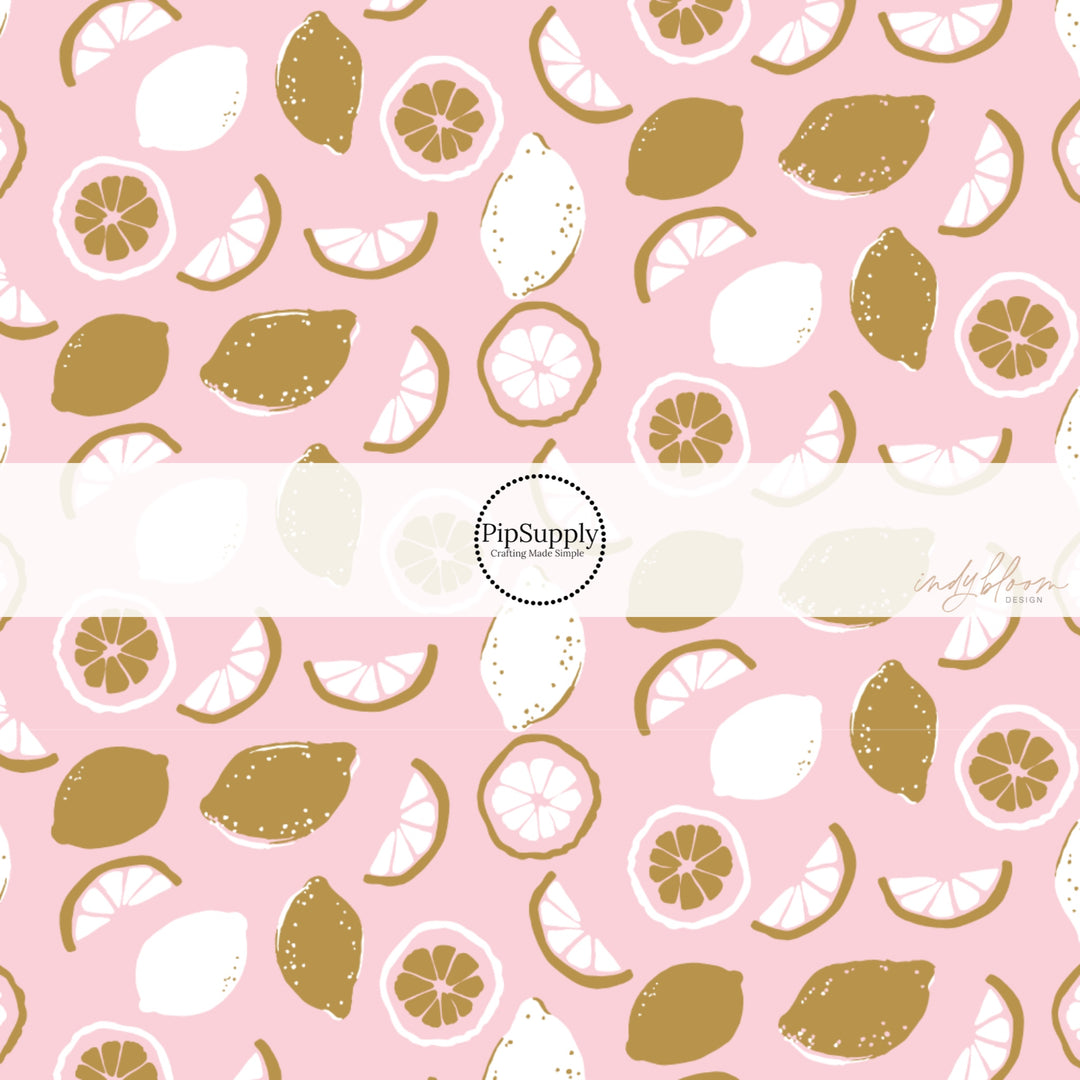 These fruit themed pattern fabric by the yard features the following design elements: lemons and lemon slices on pink. This fun themed fabric can be used for all your sewing and crafting needs!