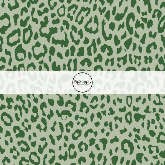 This classic leopard pattern themed fabric by the yard features green colored leopard print. This fun Valentine's Day themed fabric can be used for all your sewing and crafting needs! 
