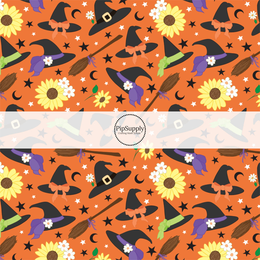 These Halloween themed orange fabric by the yard features witches, hats, brooms, sunflowers, small daisies, and small black stars on orange. This fun spooky themed fabric can be used for all your sewing and crafting needs! 