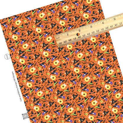 These Halloween themed orange faux leather sheets contain the following design elements: witches hats, brooms, sunflowers, small daisies, and small black stars on orange. Our CPSIA compliant faux leather sheets or rolls can be used for all types of crafting projects.
