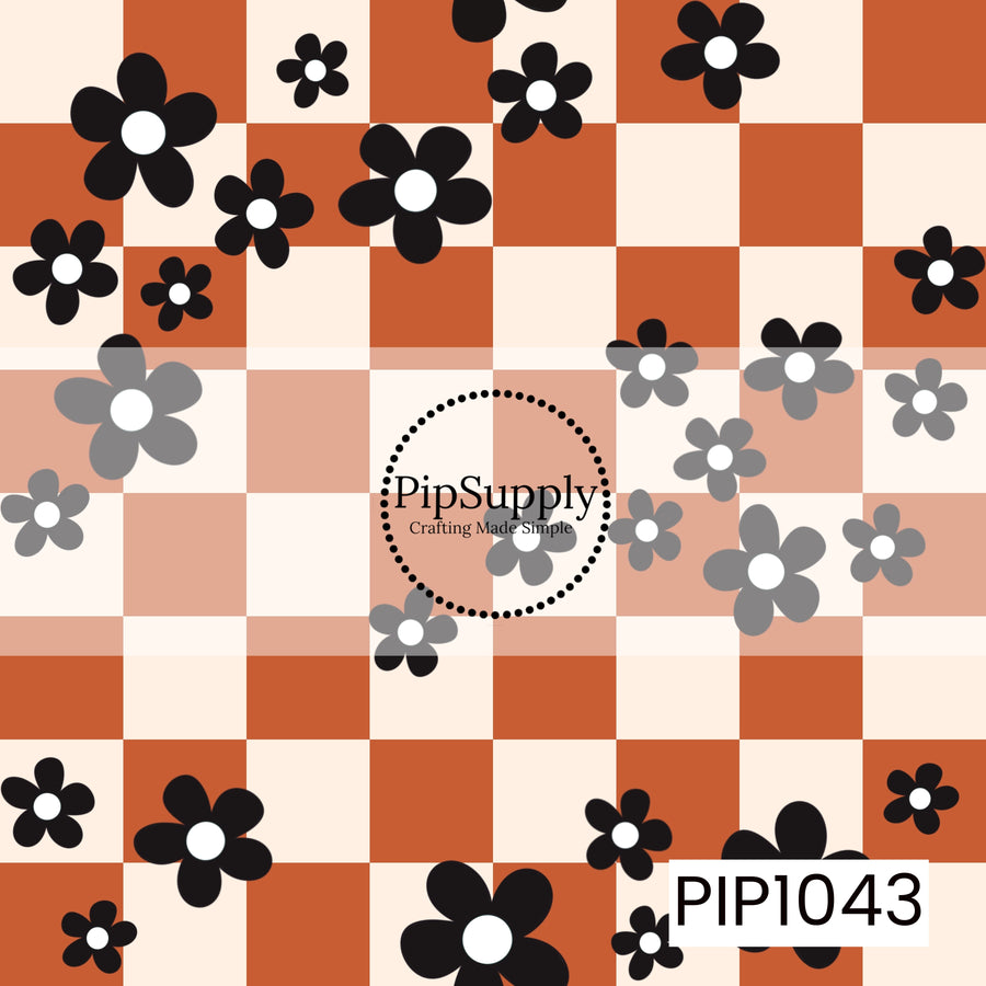 A seamless checkerboard pattern featuring warm rust orange and cream squares accented with scattered black daisy flowers in varying sizes. The retro-inspired floral design blends bold blooms with a classic checkerboard background, creating a playful vintage aesthetic with subtle Halloween color tones.
