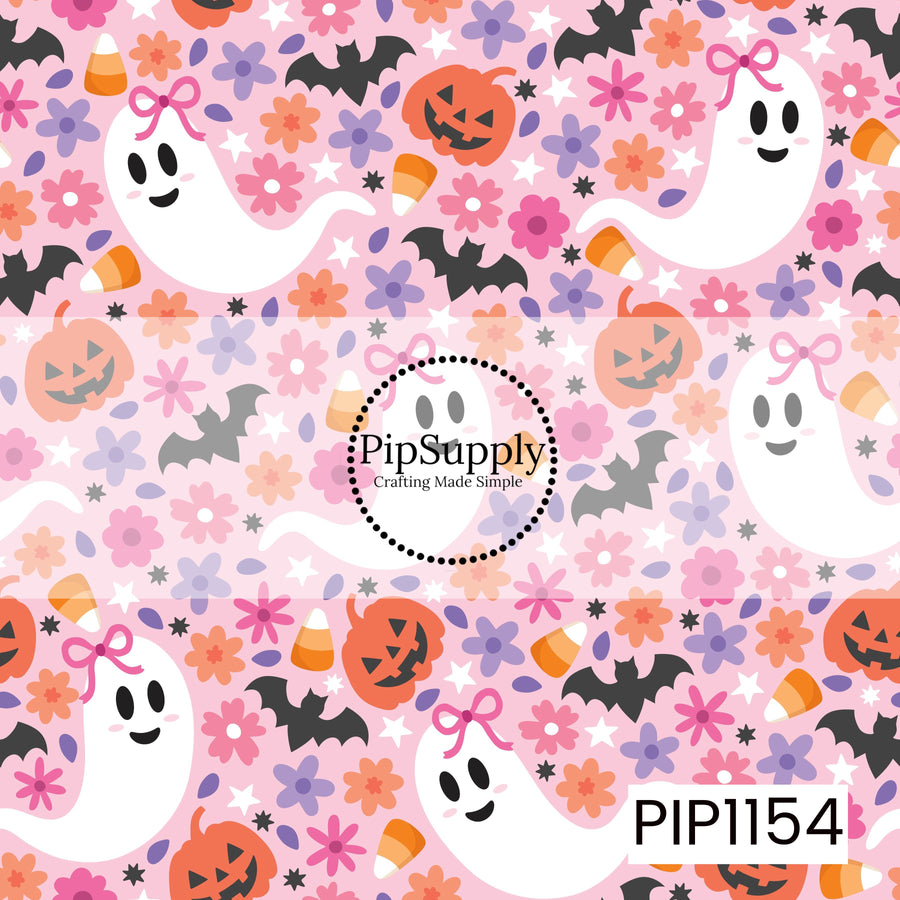 A playful Halloween pattern featuring smiling ghosts with pink bows scattered among orange pumpkins, candy corn, black bats, colorful flowers, white stars, and tiny black sparkles. The design is set on a light pink background with a bright mix of pink, lavender, orange, black, and white accents.
